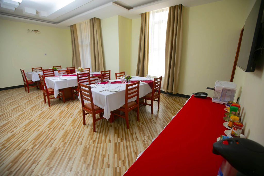 SNOW VIEW HOTEL - ROOFTOP RESTAURANT, 
Uru Rd Tanzania